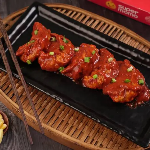 Corn and Cheese Pan Fried Momo in Chilli Garlic