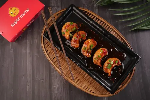 Chicken Cheese Pan Fried Momo in Sweet Chilli
