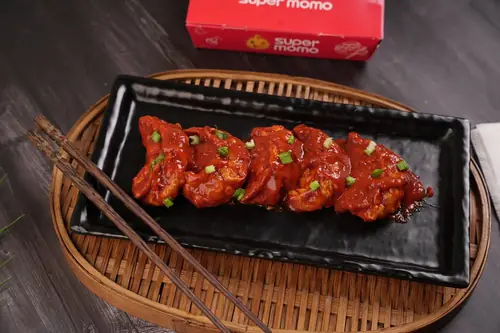 Chicken Pan Fried Momo in Chilli Garlic