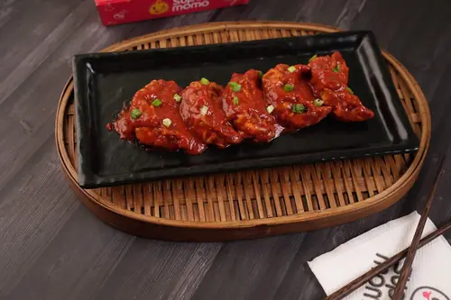 Chicken Pan Fried Momo in Schezwan