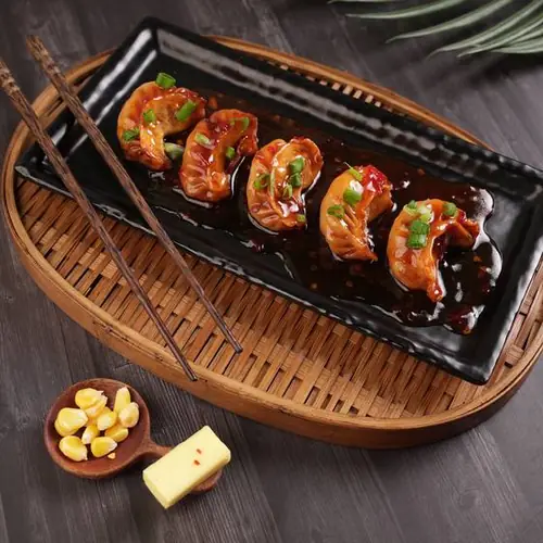 Corn and Cheese Pan Fried Momo in Sweet Chilli