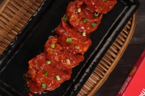 Chicken Cheese Pan Fried Momo in Chilli Garlic